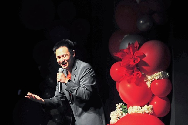 Comedian Douglas Lim cracking jokes at the event.