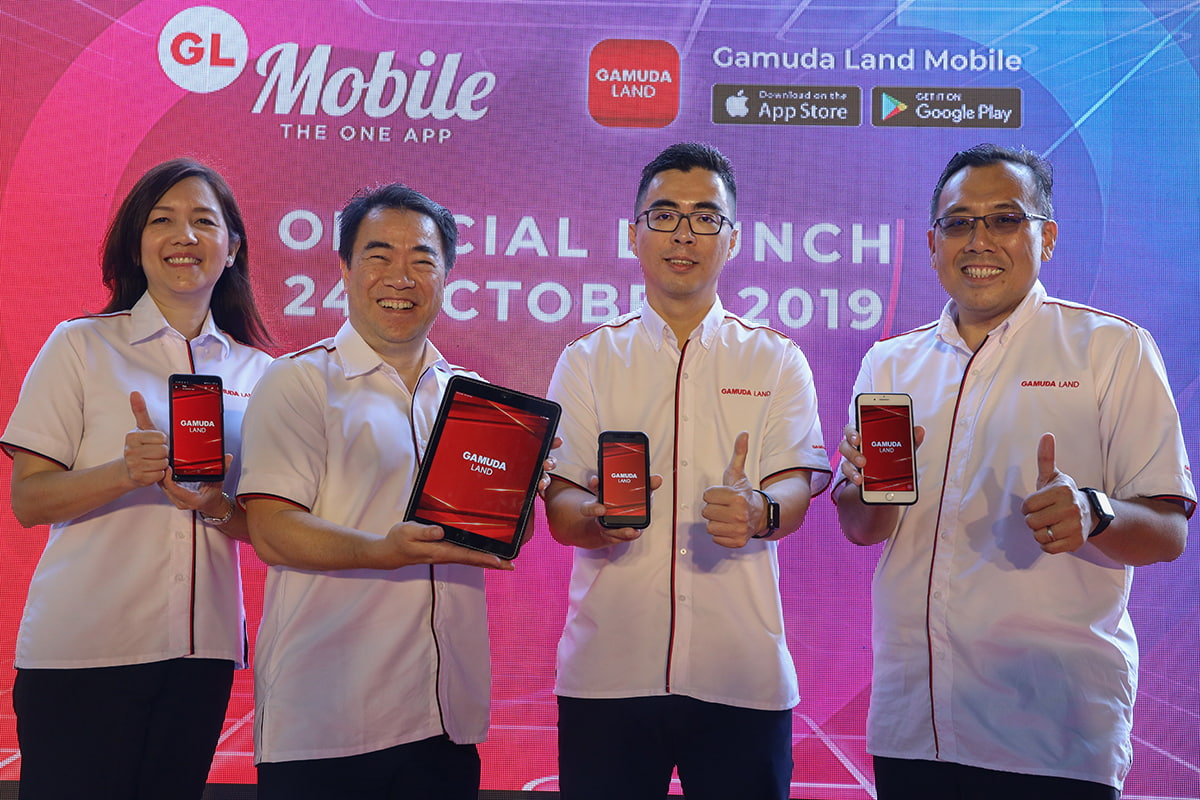 (From left) Gamuda Land marketing and sales executive director Lillian Lung Hian Li, chief executive officer Ngan Chee Meng, Aw and finance general manager David Ng Kit Cheong at the launch of the developer's app.